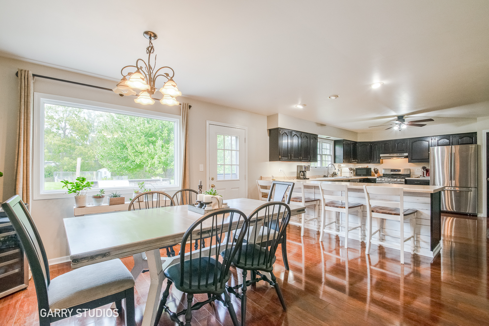 28824 Rivers Edge Drive Cary, IL 60013 - Photo 7 of 39 a view of a dining room with furniture window and outside view