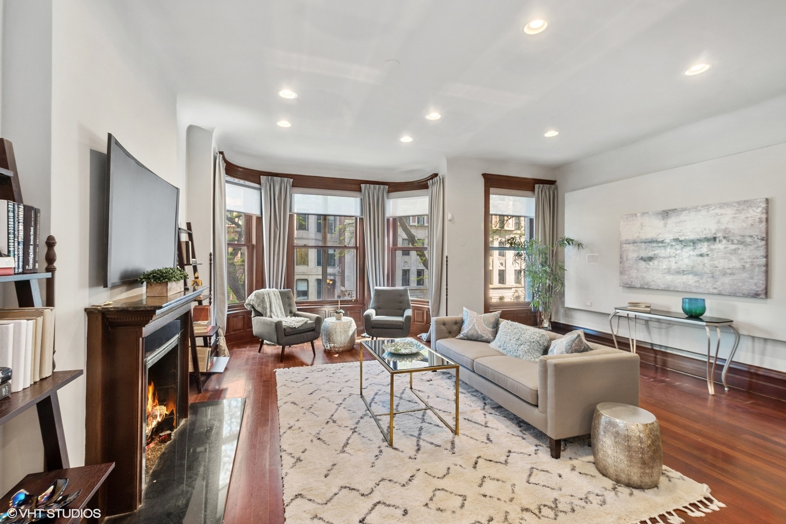 67 East Cedar Street Chicago, IL 60611 - Photo 11 of 37 a living room with furniture and a flat screen tv