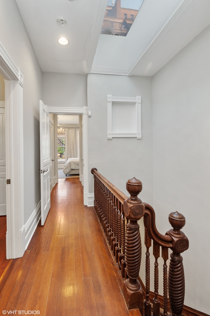 67 East Cedar Street Chicago, IL 60611 - Photo 26 of 37 a view of a hallway with wooden floor