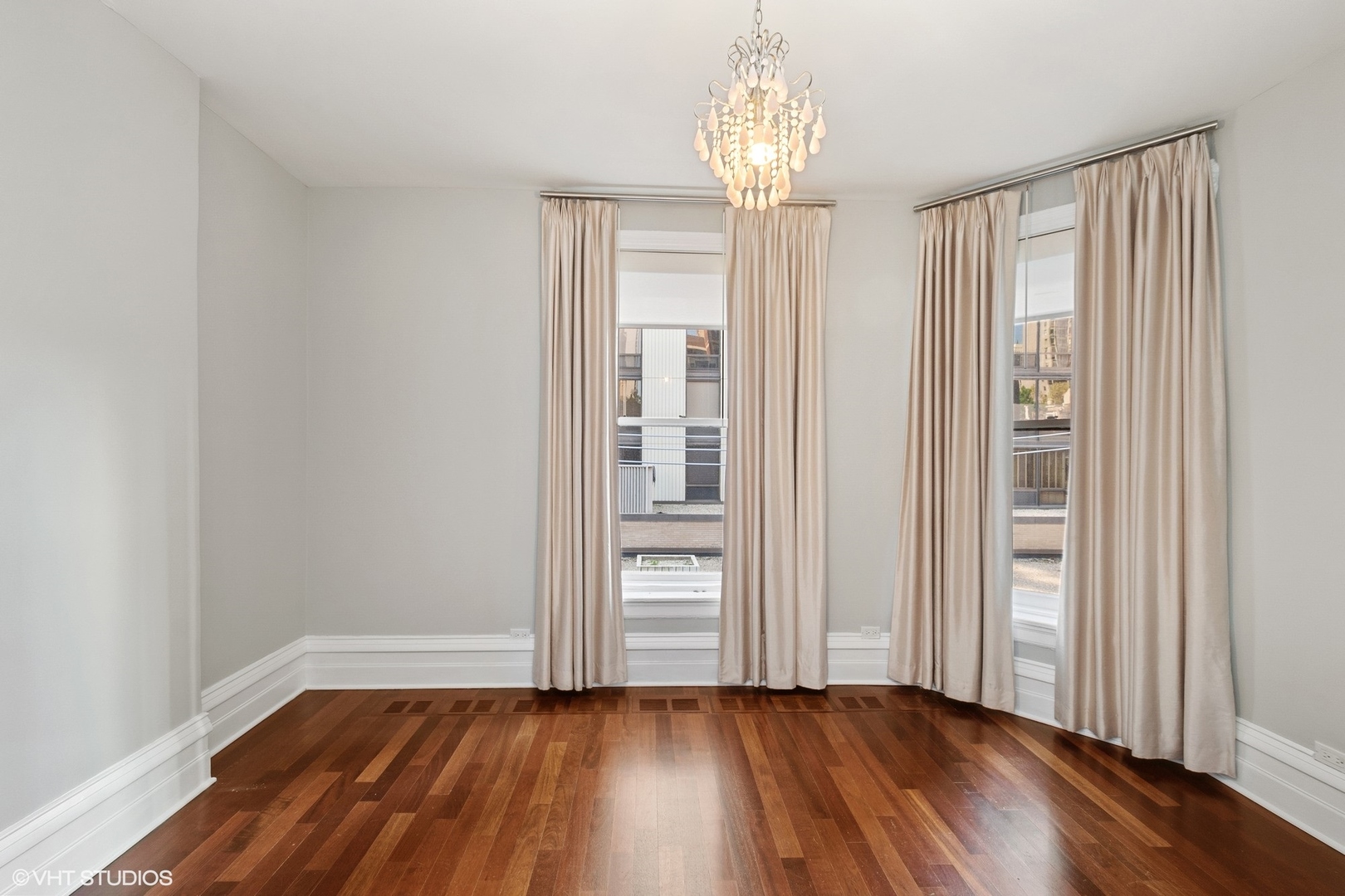 67 East Cedar Street Chicago, IL 60611 - Photo 27 of 37 wooden floor in an empty room with a window