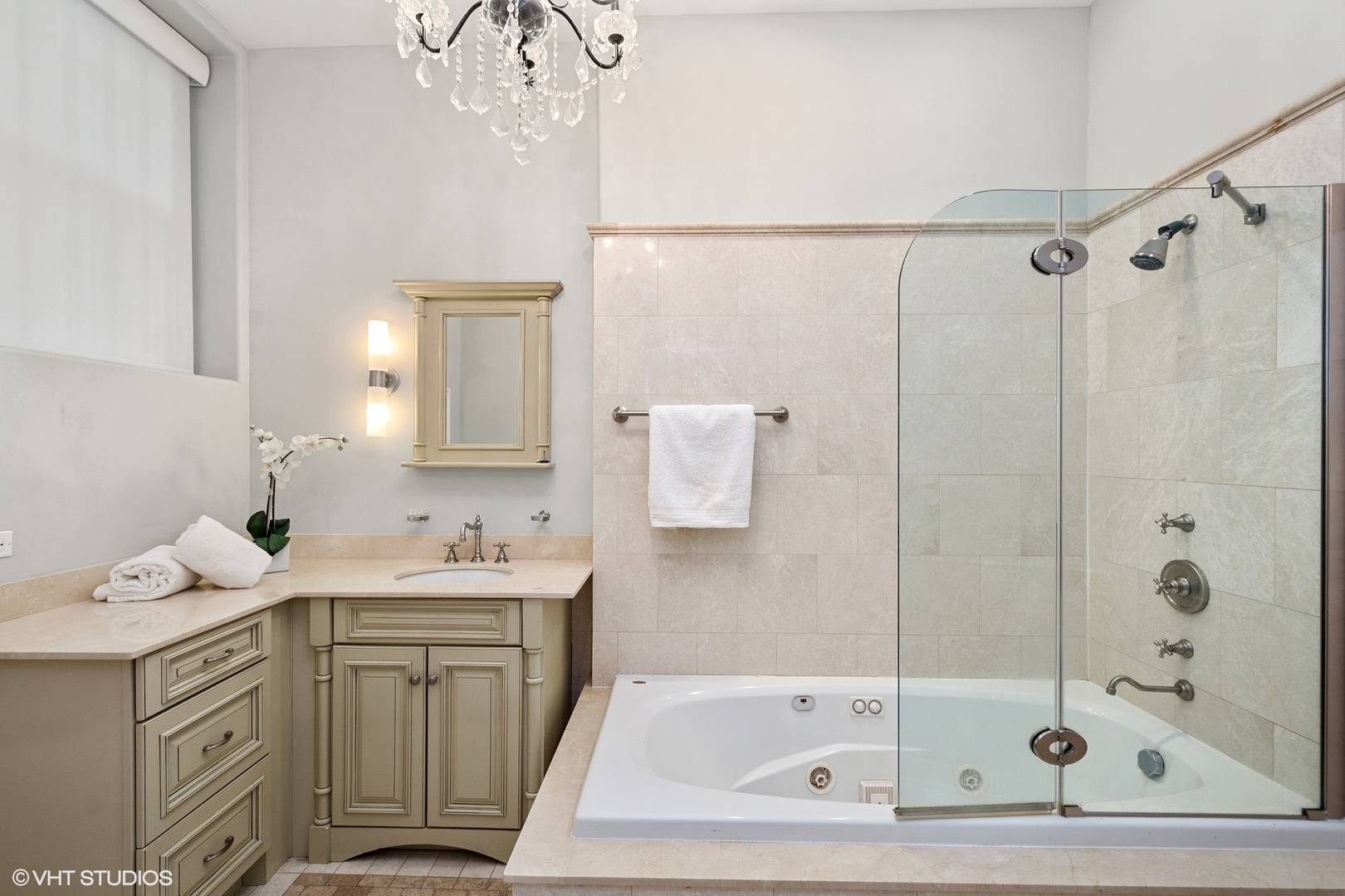 67 East Cedar Street Chicago, IL 60611 - Photo 29 of 37 a bathroom with a sink vanity tub and shower