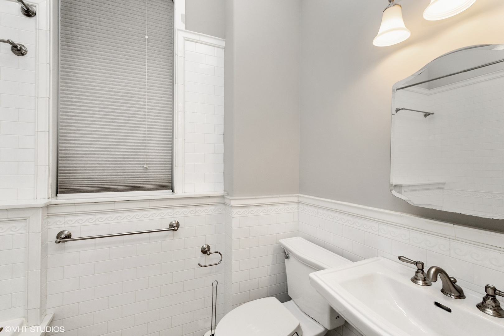 67 East Cedar Street Chicago, IL 60611 - Photo 30 of 37 a bathroom with a sink a toilet and shower
