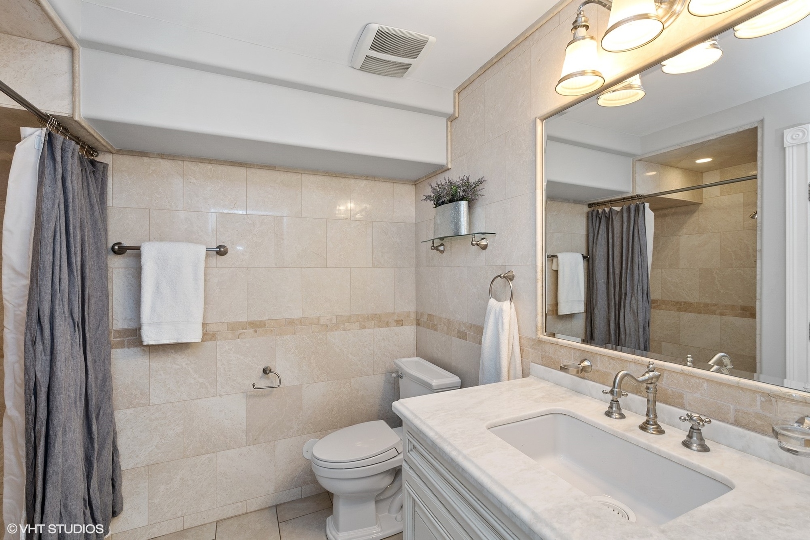 67 East Cedar Street Chicago, IL 60611 - Photo 32 of 37 a bathroom with a sink toilet and shower