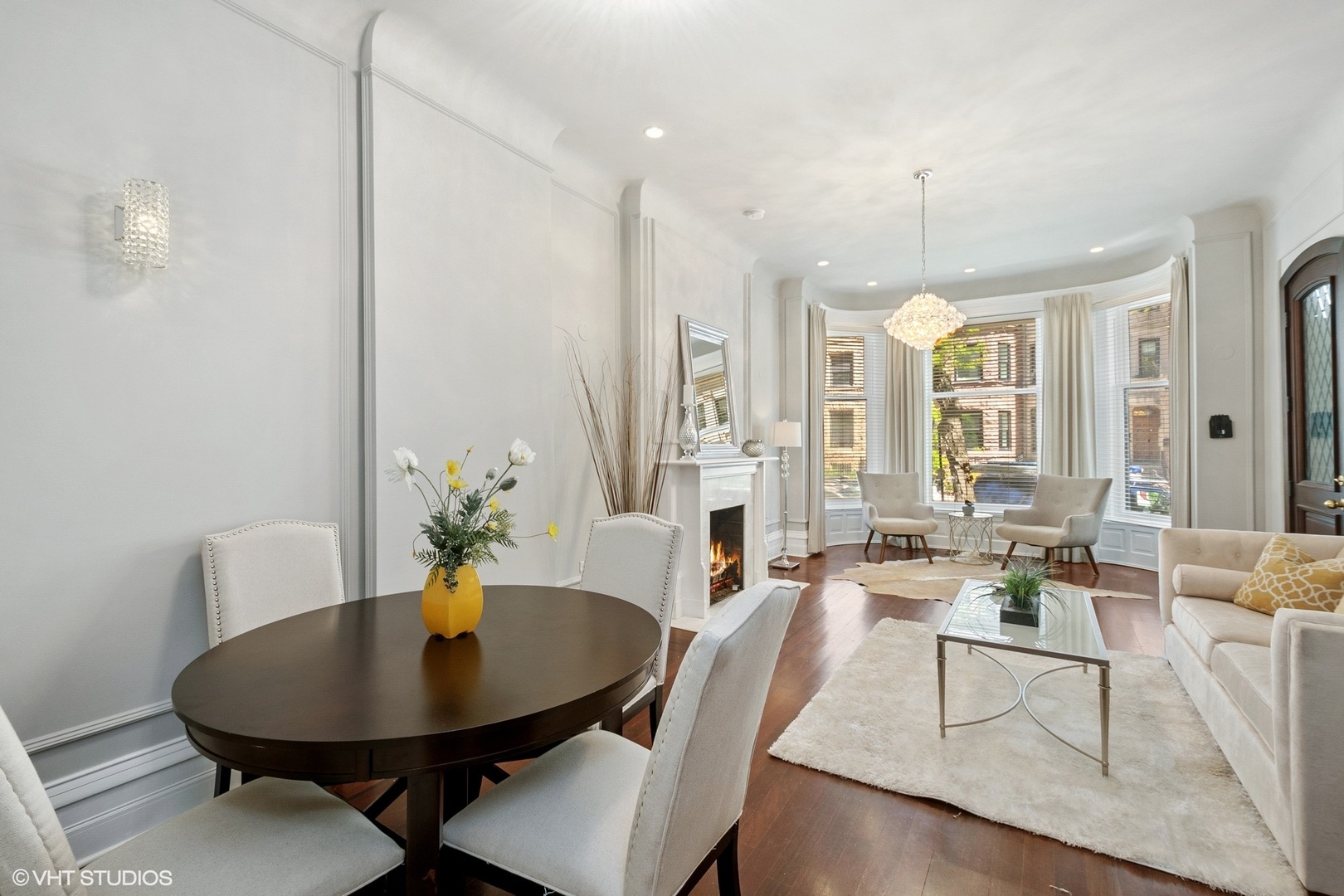 67 East Cedar Street Chicago, IL 60611 - Photo 5 of 37 a view of a a dining room with furniture window and wooden floor