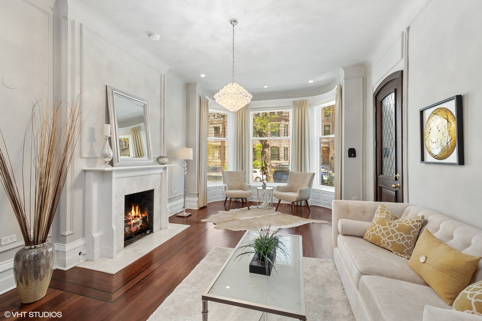 67 East Cedar Street Chicago, IL 60611 - Photo 6 of 37 a living room with furniture fireplace and window
