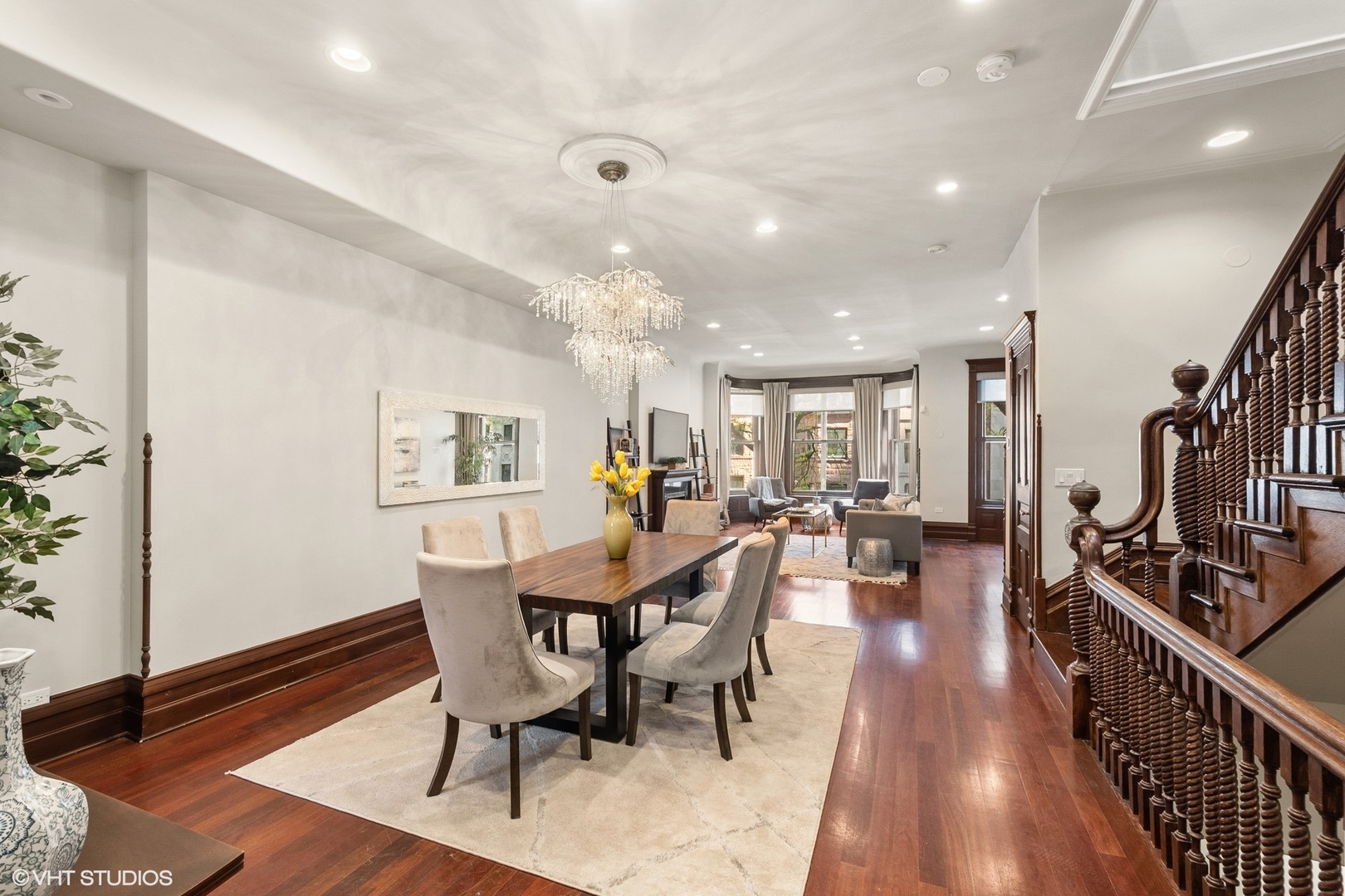 67 East Cedar Street Chicago, IL 60611 - Photo 8 of 37 a view of a dining room with furniture and wooden floor
