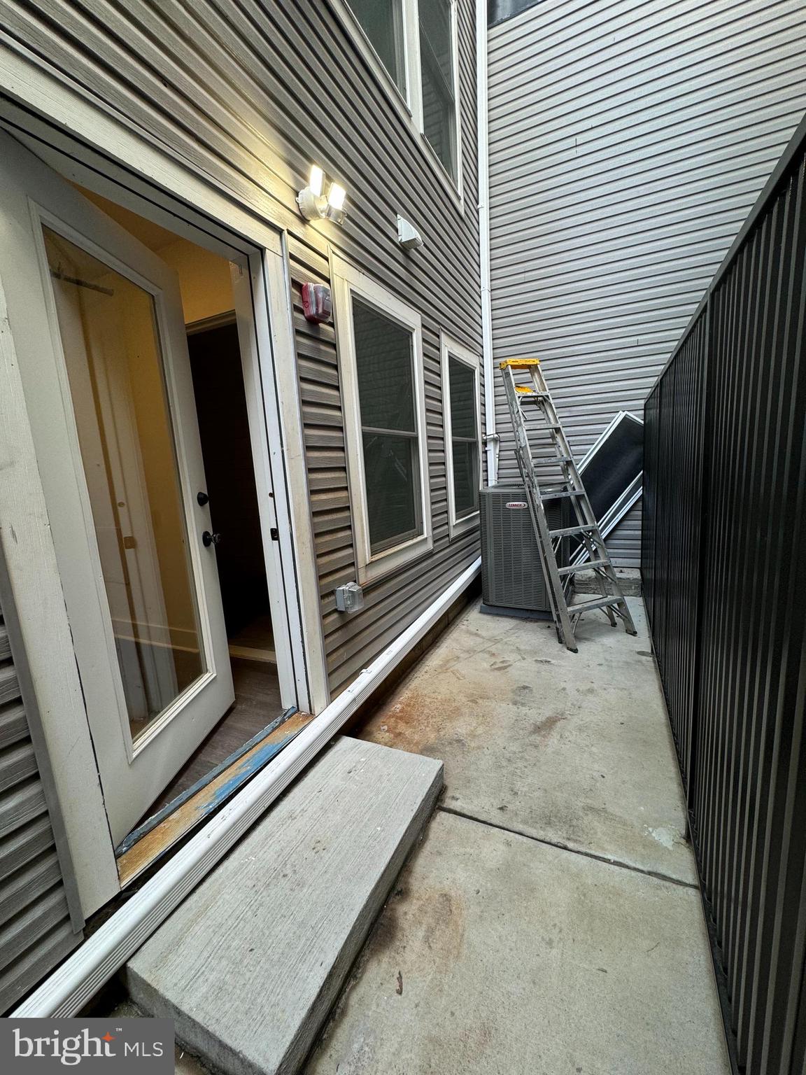 2331 East Thompson Street, Unit 1 Philadelphia, PA 19125 - Photo 6 of 6 a view of backyard with furniture and a window