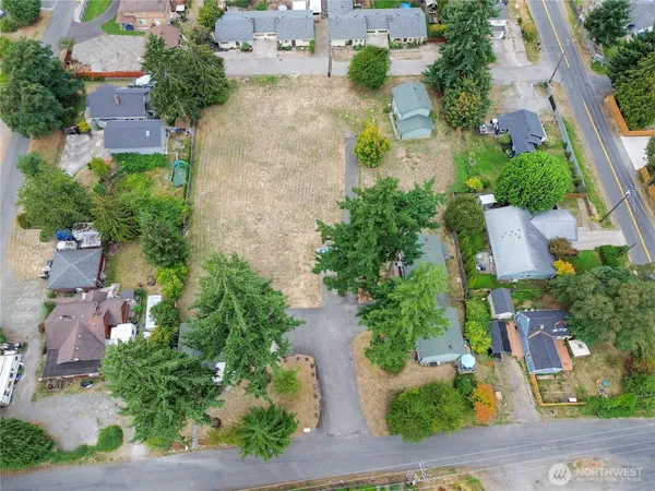 an aerial view of a house with outdoor space