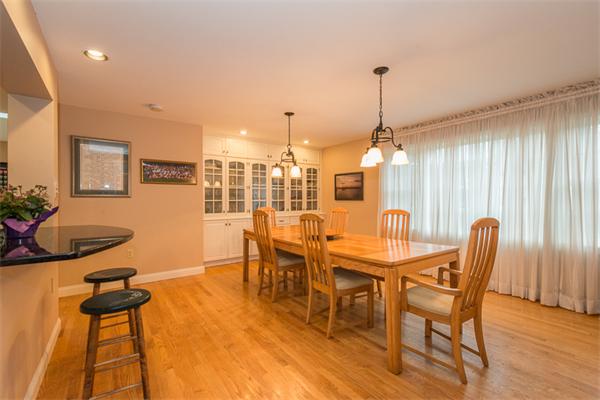 4 Farm Road Lexington, MA 02420 - Photo 4 of 28 a dining room with furniture a chandelier and wooden floor