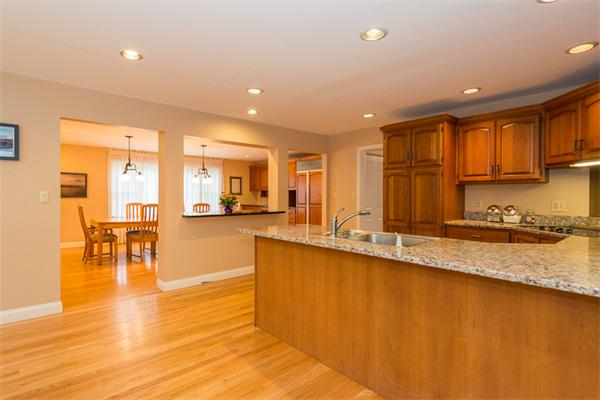 4 Farm Road Lexington, MA 02420 - Photo 9 of 28 a large kitchen with lots of counter space and a sink