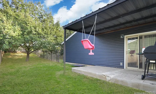 a view of a backyard with a garden