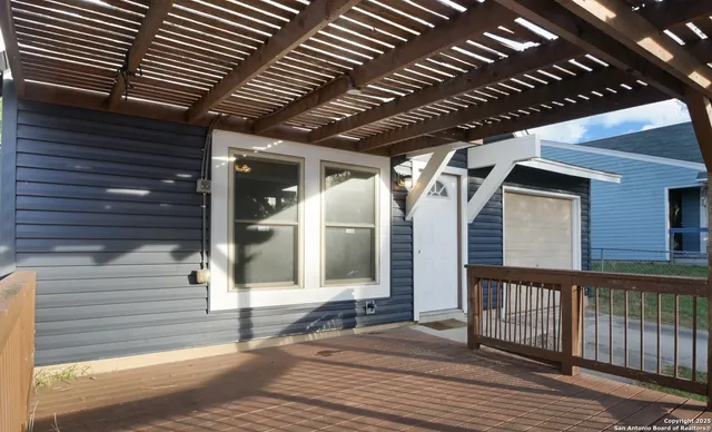 a view of a house with a roof deck