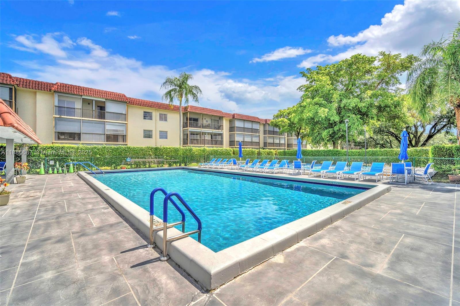150 South Hollybrook Terrace, Unit 101 Pembroke Pines, FL 33025 - Photo 28 of 31 a view of swimming pool is outdoor seating