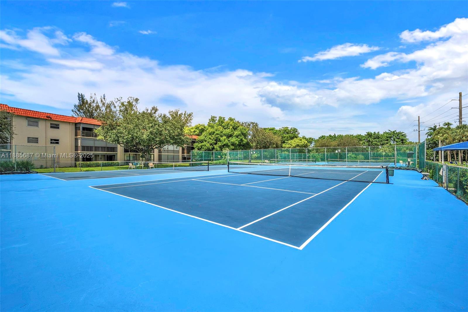 150 South Hollybrook Terrace, Unit 101 Pembroke Pines, FL 33025 - Photo 29 of 31 a view of a tennis court