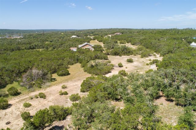 a view of a city with an ocean view