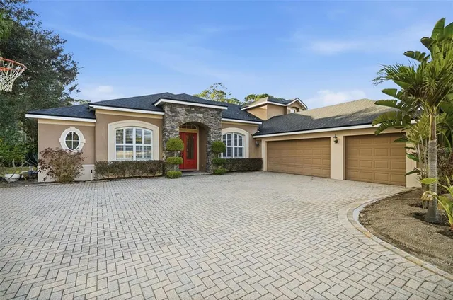 front view of a house with a chairs