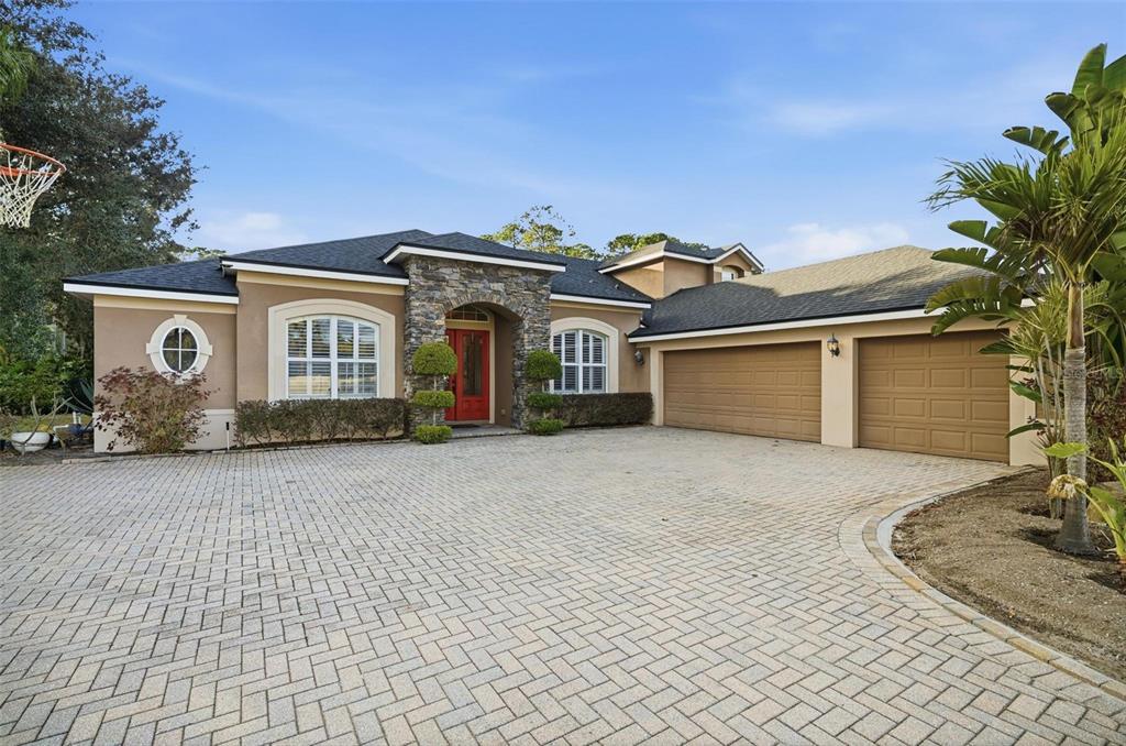 front view of a house with a chairs