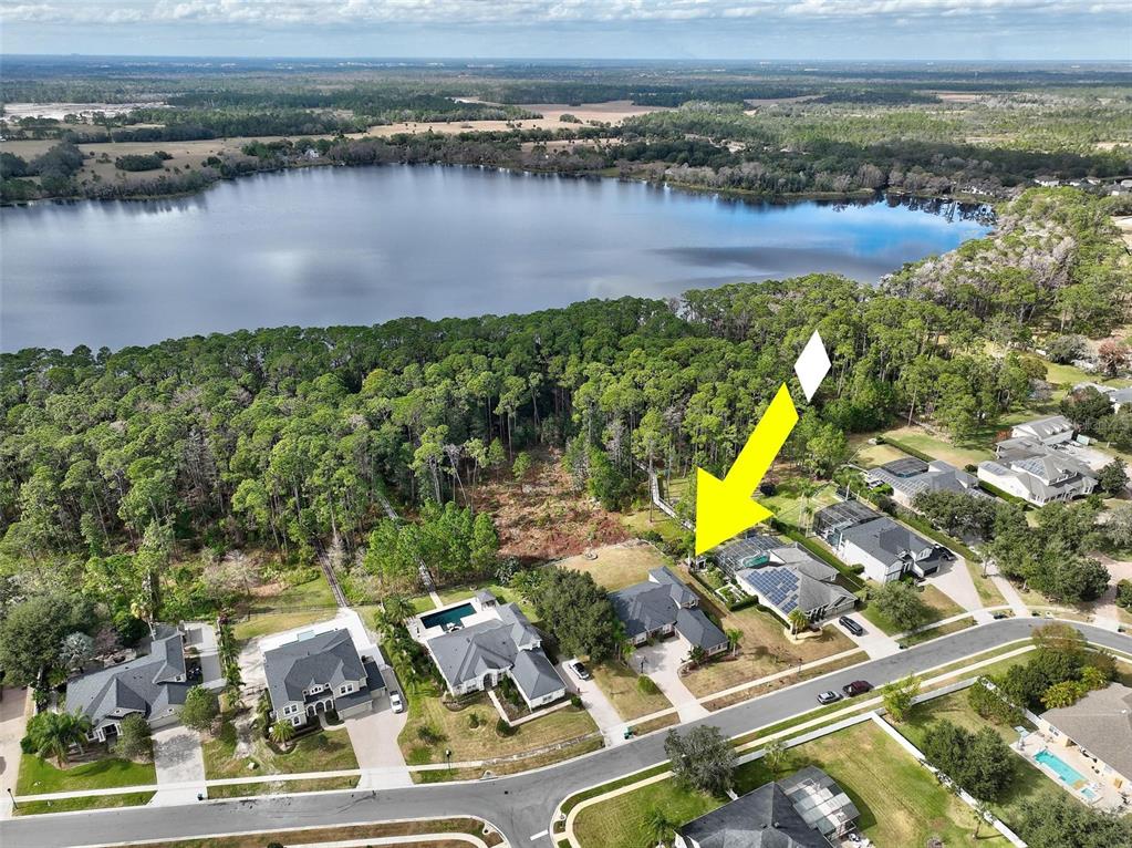 2914 Lee Shore Loop Orlando, FL 32820 - Photo 12 of 96 an aerial view of residential building with outdoor space and lake view