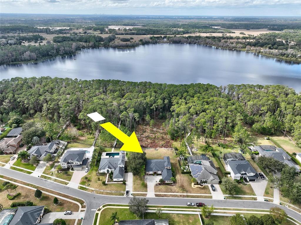 2914 Lee Shore Loop Orlando, FL 32820 - Photo 13 of 96 an aerial view of residential building with outdoor space and lake view