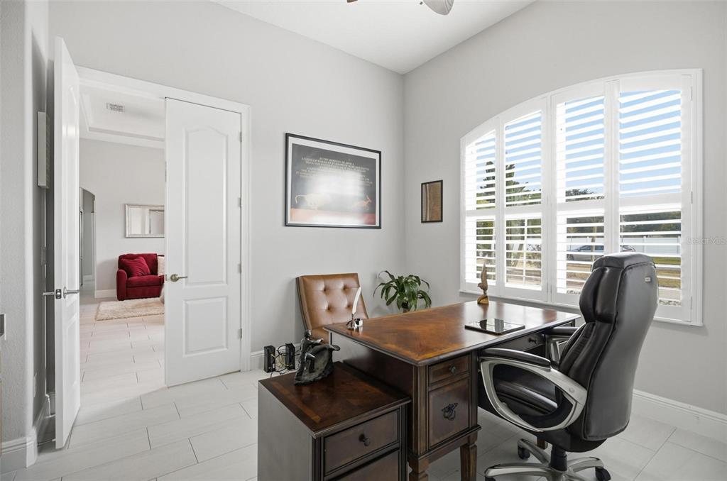 2914 Lee Shore Loop Orlando, FL 32820 - Photo 28 of 96 a view of a workspace with furniture and a window