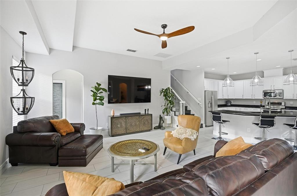 2914 Lee Shore Loop Orlando, FL 32820 - Photo 40 of 96 a living room with furniture and a flat screen tv