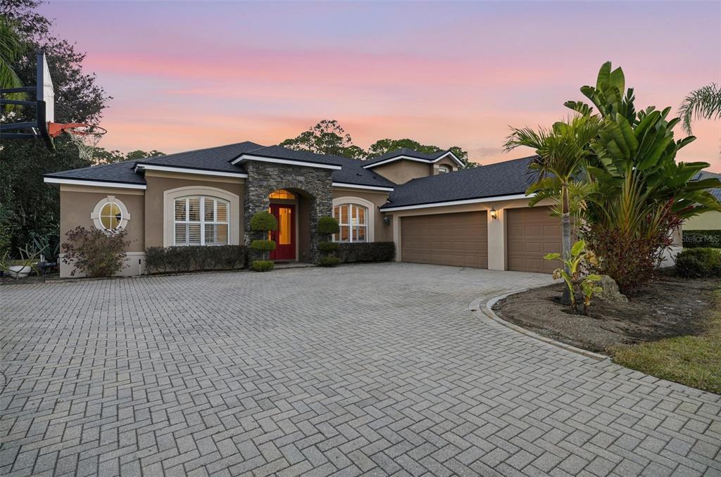 2914 Lee Shore Loop Orlando, FL 32820 - Photo 5 of 96 a front view of a house with a yard