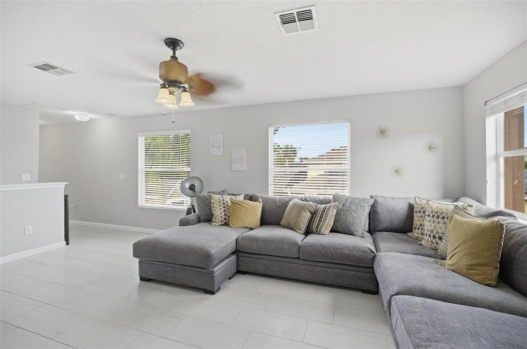 2914 Lee Shore Loop Orlando, FL 32820 - Photo 74 of 96 a living room with furniture and a large window