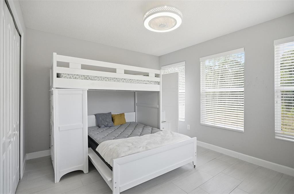 2914 Lee Shore Loop Orlando, FL 32820 - Photo 77 of 96 a bedroom with a bed and window