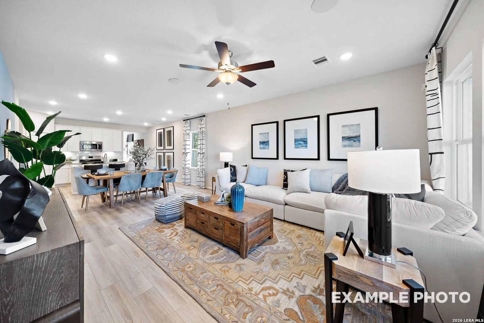16611 Rosemary Ridge Elmendorf, TX 78112 - Photo 5 of 32 a living room with furniture and a lamp