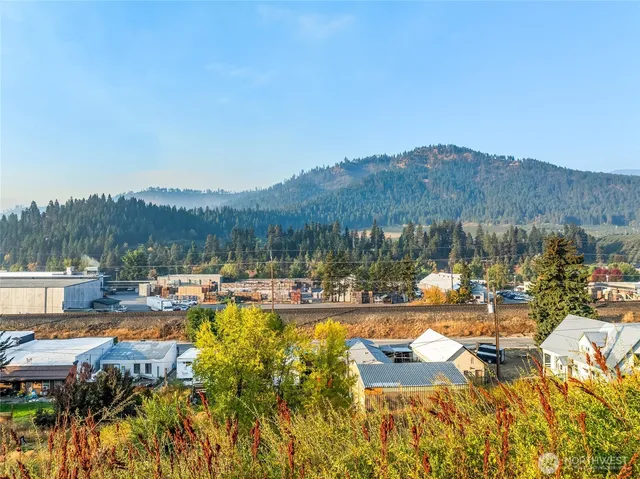 a view of a swimming pool with lounge chair