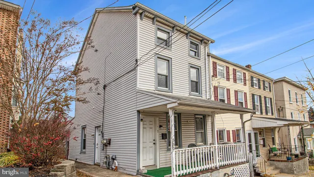 a front view of a house with a balcony