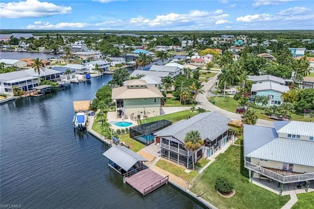 an aerial view of a houses with outdoor space