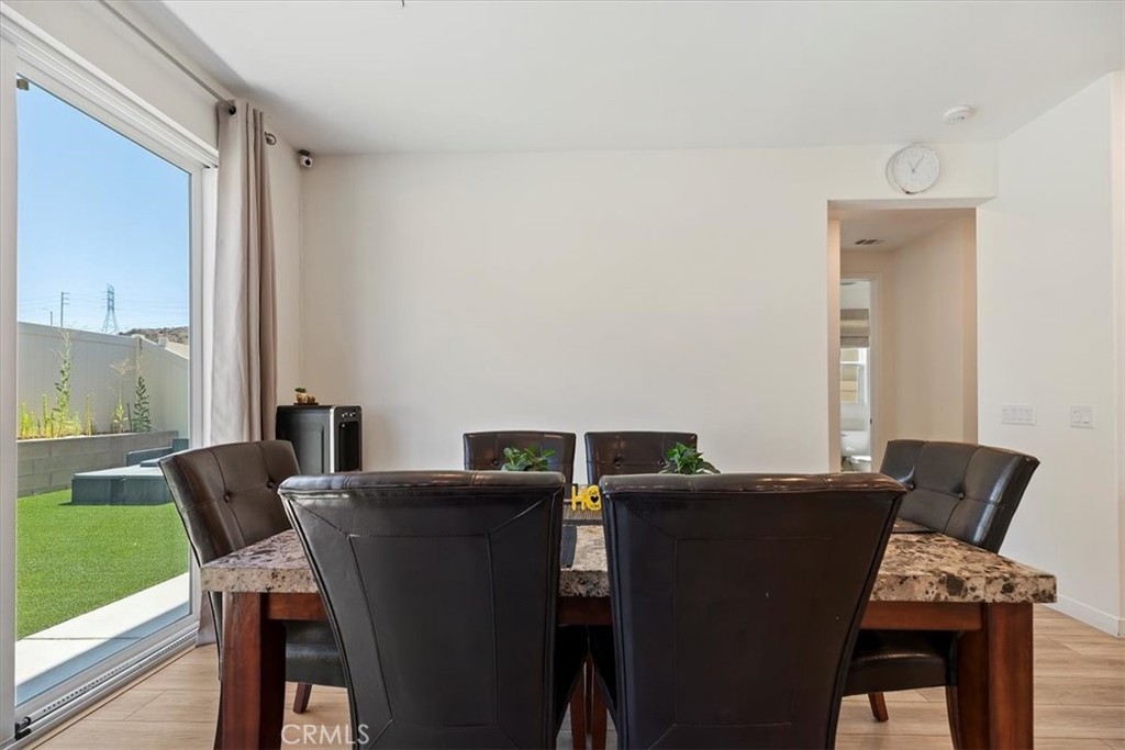 20911 Jennings Way Newhall, CA 91321 - Photo 19 of 50 a view of a dining room with furniture and window