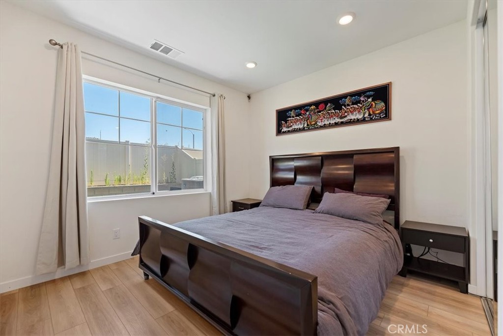20911 Jennings Way Newhall, CA 91321 - Photo 22 of 50 a bedroom with a bed and a window