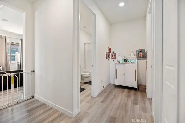 a bedroom with a bed and a table in it