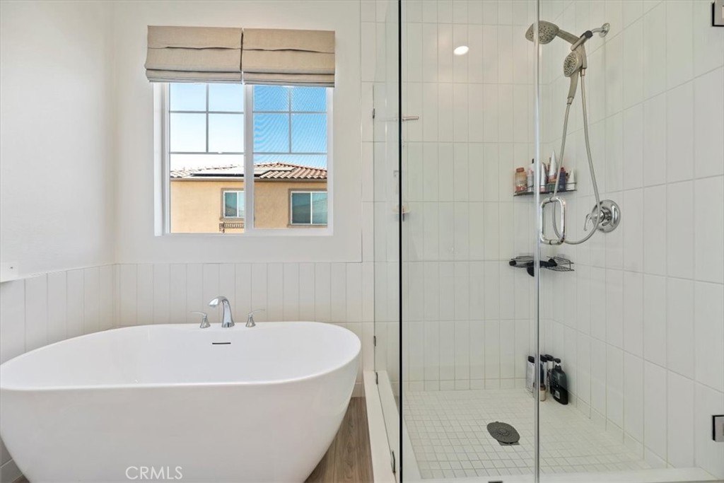 20911 Jennings Way Newhall, CA 91321 - Photo 40 of 50 a white bath tub sitting next to a shower