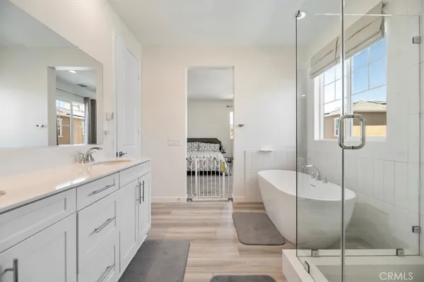 a view of yard with swimming pool and seating