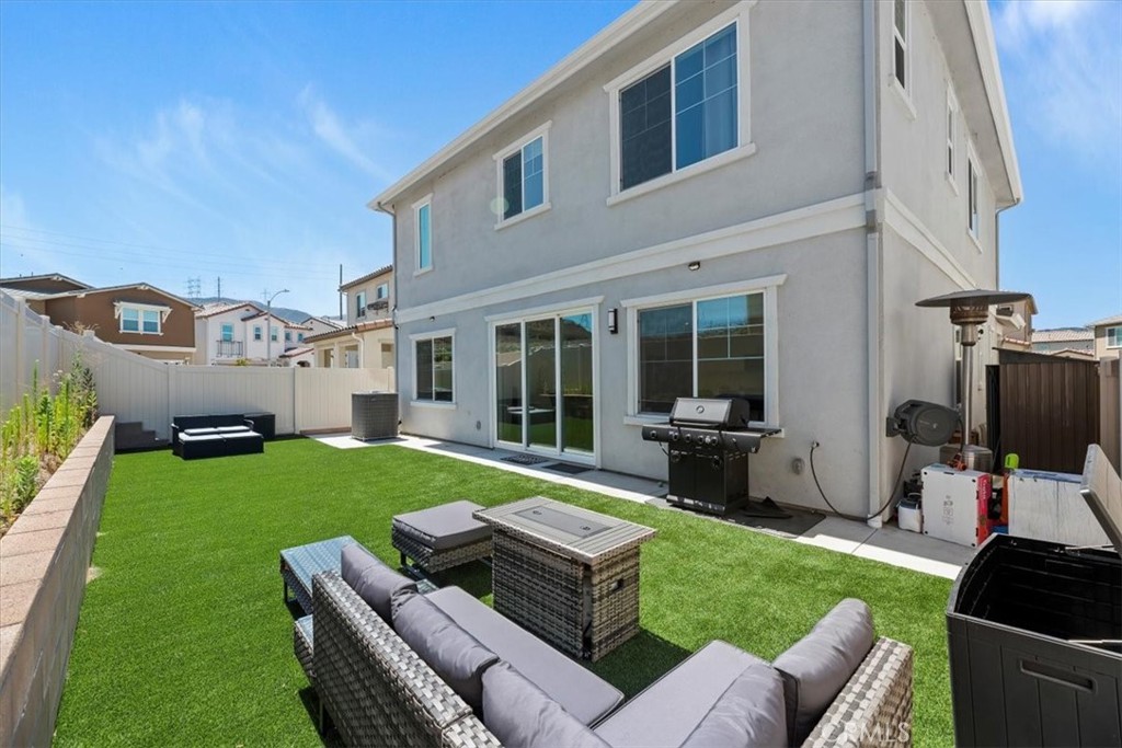 20911 Jennings Way Newhall, CA 91321 - Photo 45 of 50 a view of a house and a back yard