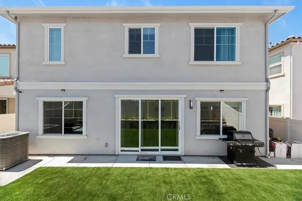 a house view with a garden space