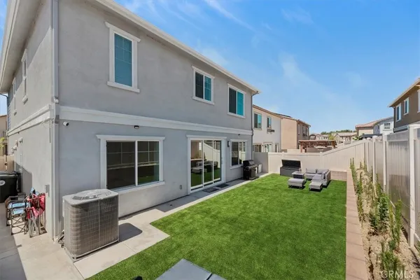 a house view with a garden space