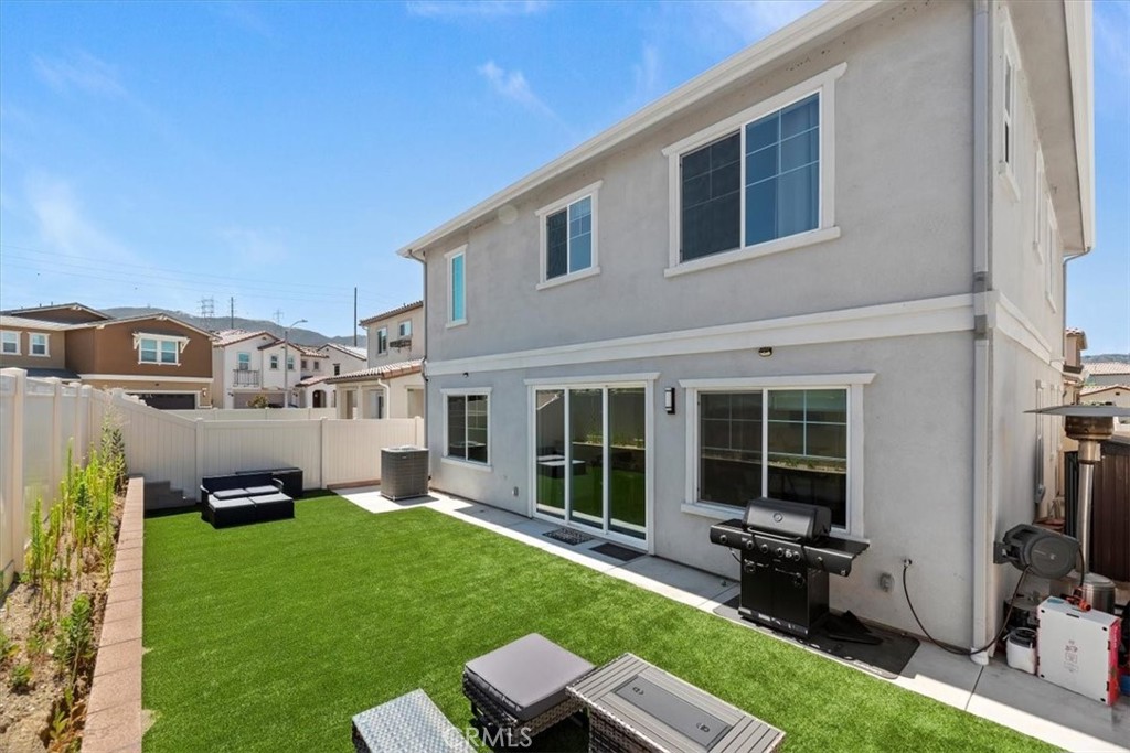 20911 Jennings Way Newhall, CA 91321 - Photo 49 of 50 a house view with a garden space