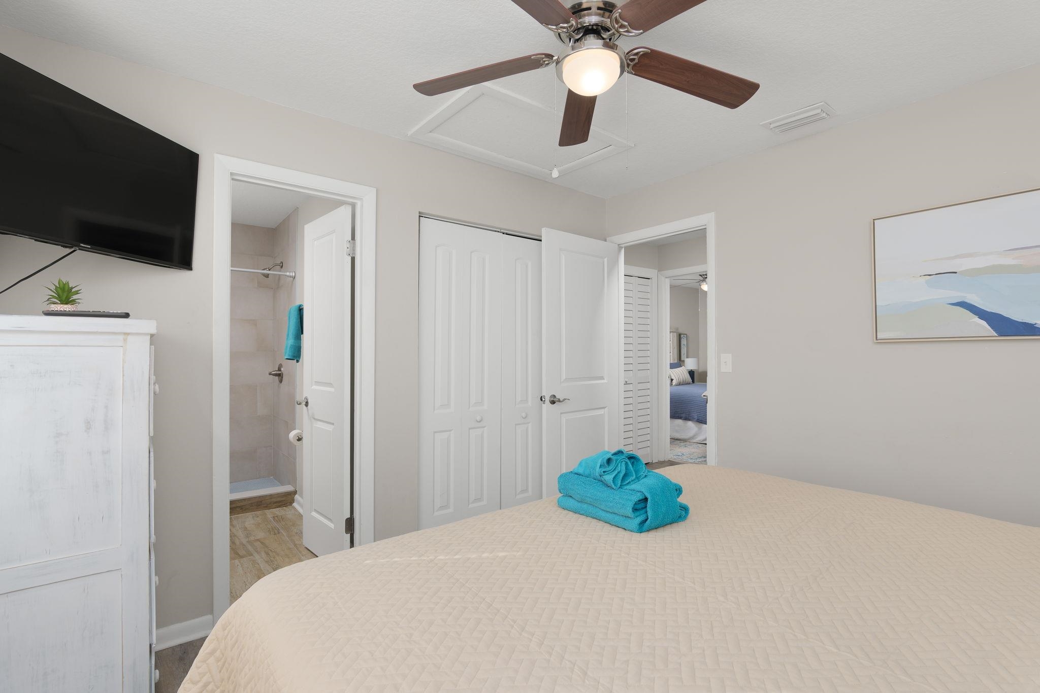 16 Ewing Street St. Augustine Beach, FL 32080 - Photo 26 of 55 a bedroom with a bed and a flat screen tv