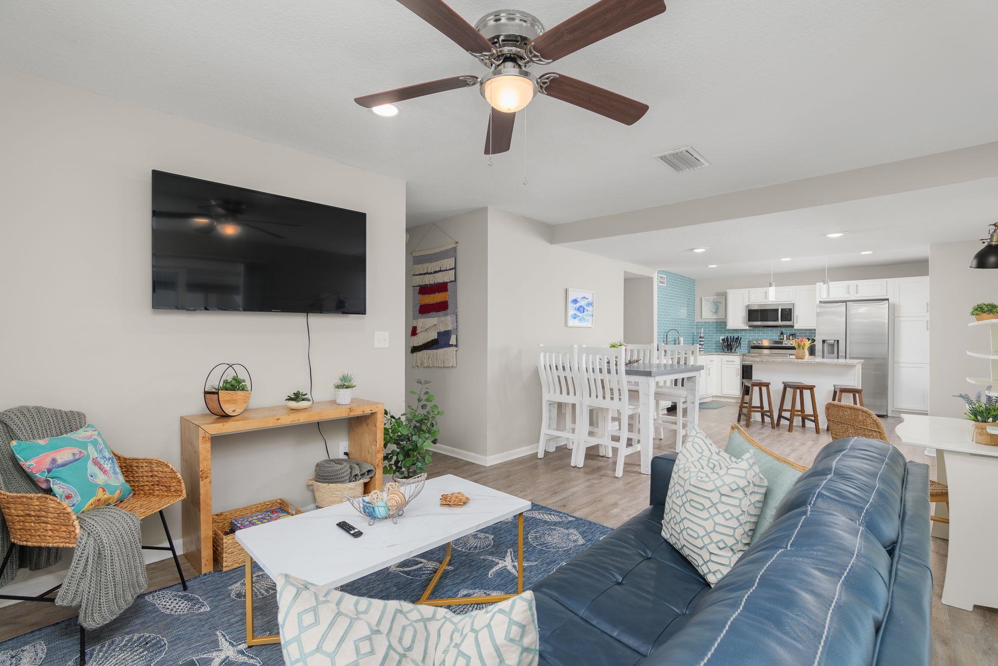 16 Ewing Street St. Augustine Beach, FL 32080 - Photo 28 of 55 a living room with furniture and a flat screen tv