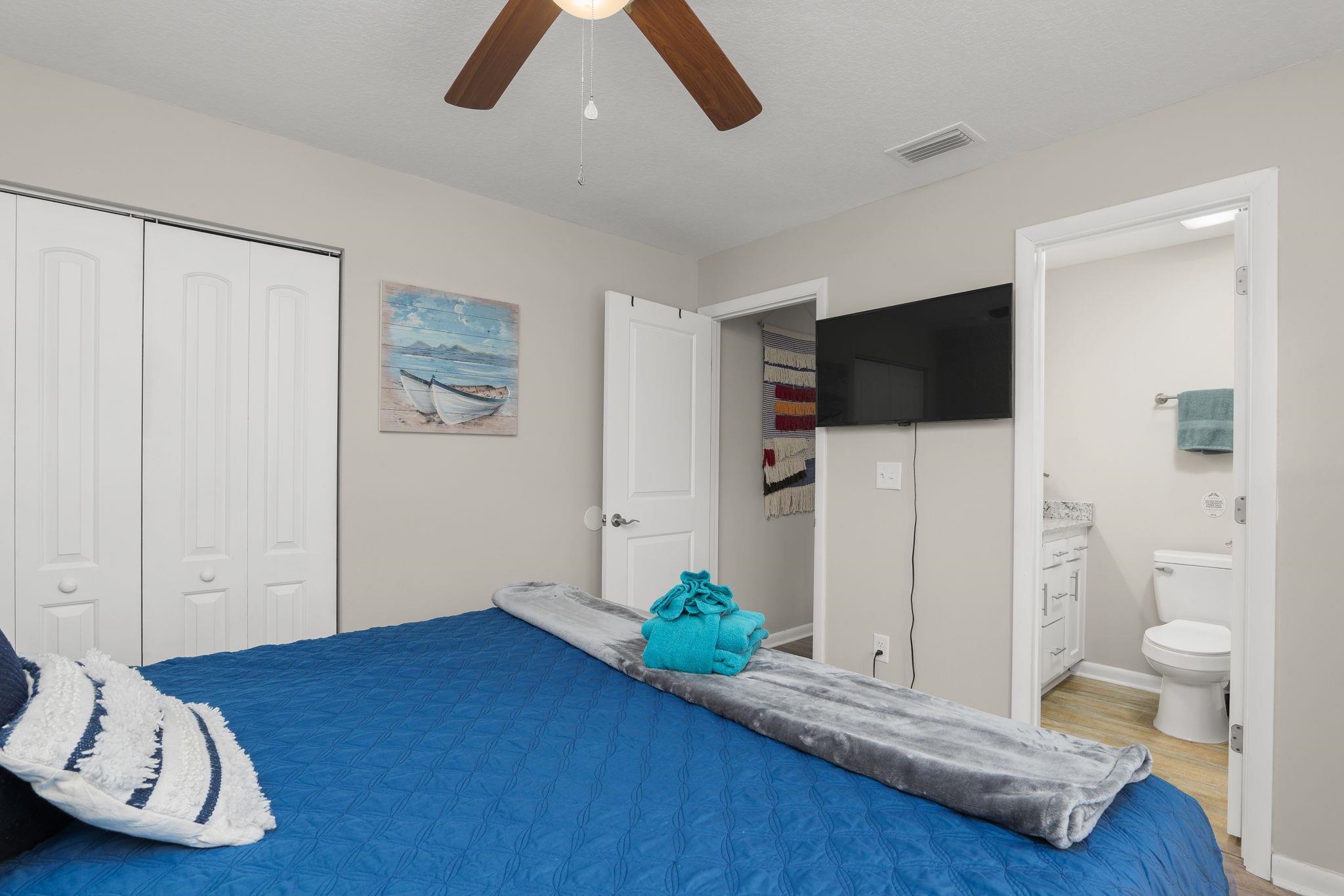 16 Ewing Street St. Augustine Beach, FL 32080 - Photo 31 of 55 a living room with furniture and a flat screen tv