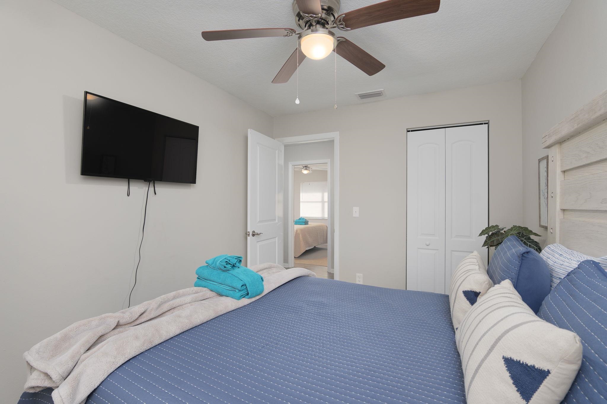 16 Ewing Street St. Augustine Beach, FL 32080 - Photo 41 of 55 a bedroom with a bed and a flat screen tv