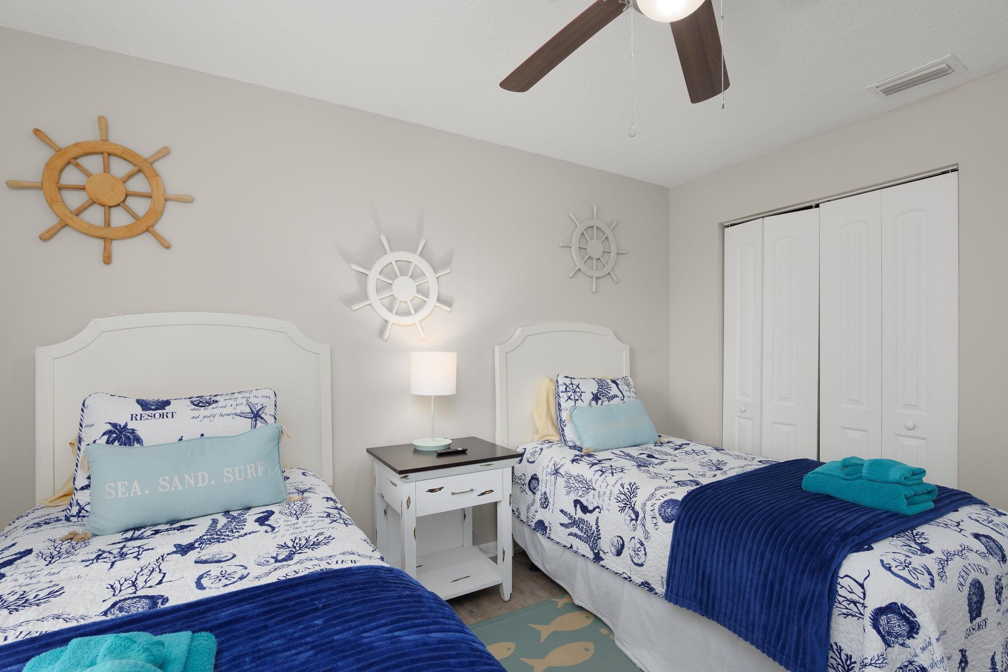 16 Ewing Street St. Augustine Beach, FL 32080 - Photo 43 of 55 a bedroom with a bed and a chandelier