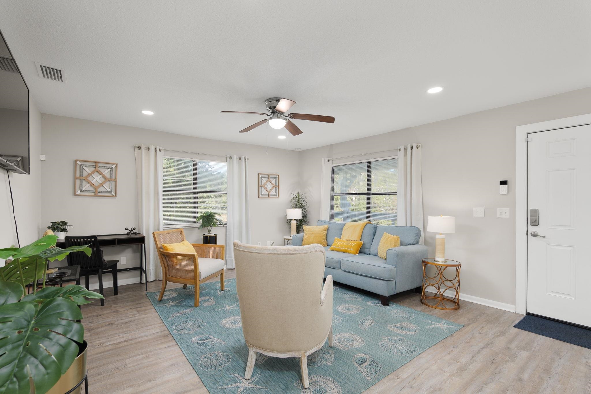 16 Ewing Street St. Augustine Beach, FL 32080 - Photo 5 of 55 a living room with furniture and a large window