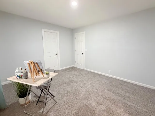 a workspace with furniture and wooden floor