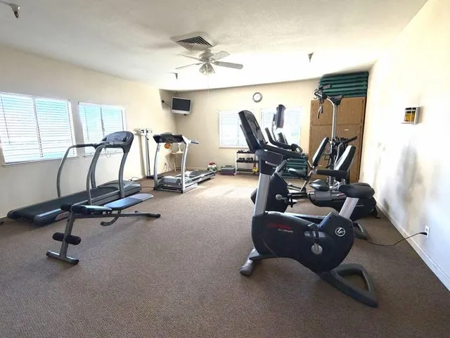 a view of a room with gym equipment