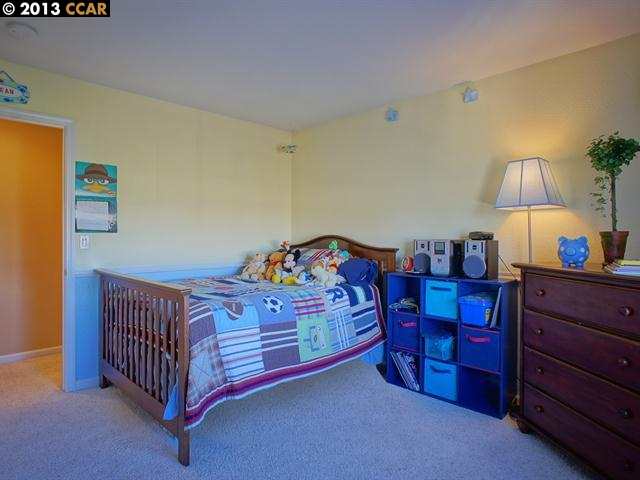 Terraced Hills Way San Ramon, CA 94583 - Photo 11 of 15 a bed room with a bed and a lamp